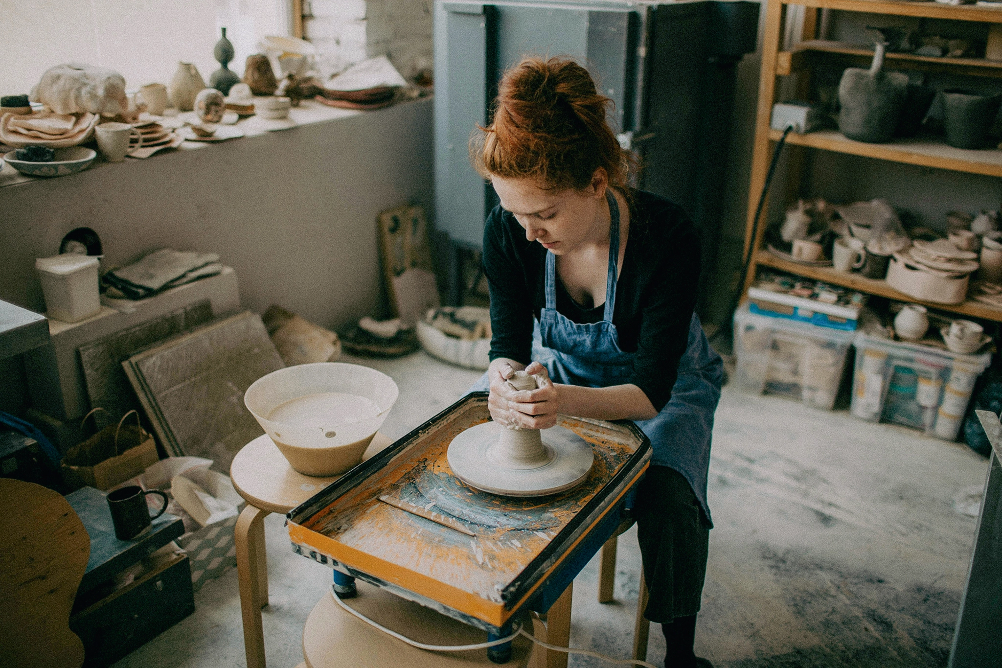 Small business pottery studio manages debt utilization